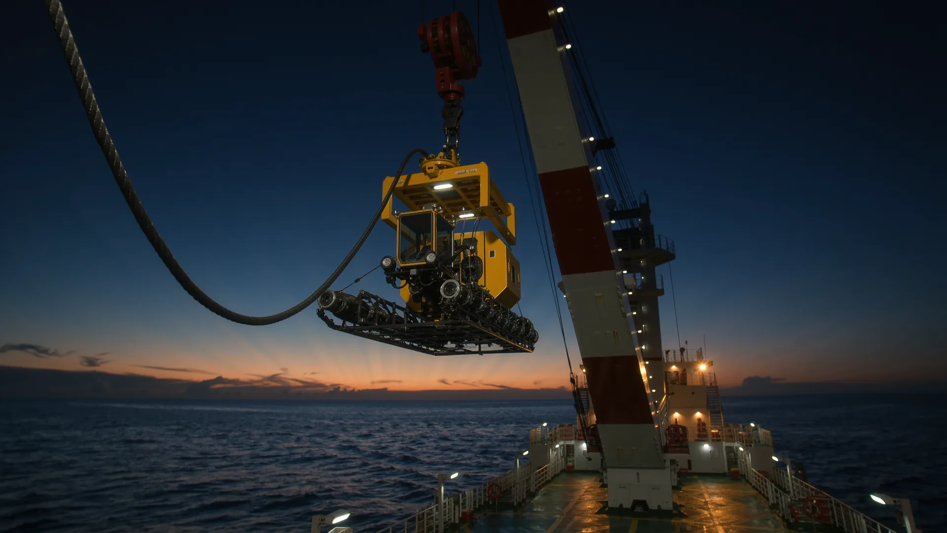 Work-class remotely operated underwater vehicle on the deck of a support vessel